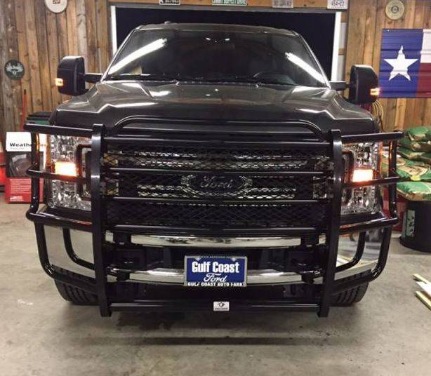 How does the standard brush guard attach on a 2021 ford super duty?